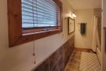 Driveway Entry Level First Floor: Master Suite w/ Queen Bed - En Suite with Tub/Shower Combo
